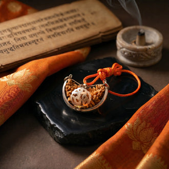 Original 1 Mukhi Rudraksha placed on a balck stone