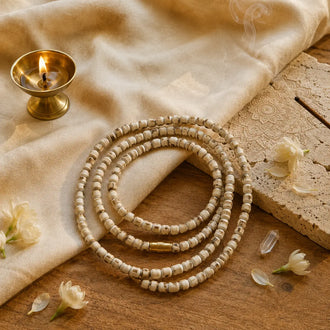 Original Tulsi Kanthi Mala – Double Round, 6 mm, placed on a wooden slab