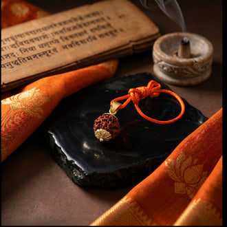 1 mukhi rudraksha sitting on marble