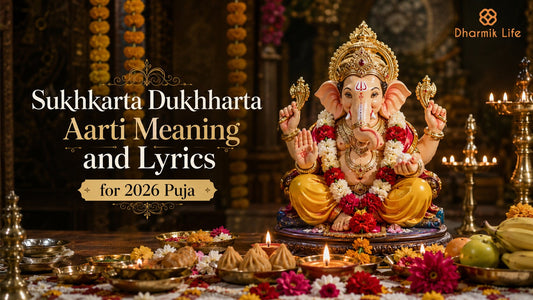 Ganesha idol surrounded by flowers and diyas