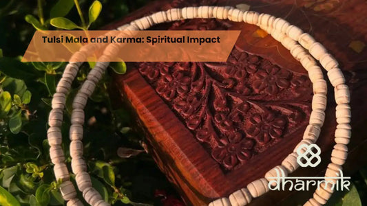 Tulsi mala beads placed on a carved wooden box with green tulsi leaves, representing spiritual purity, karma balance, and satvik living.