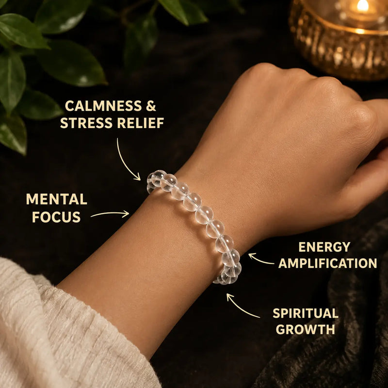 Hand wearing a clear quartz beaded bracelet with text on benefits against a dark background