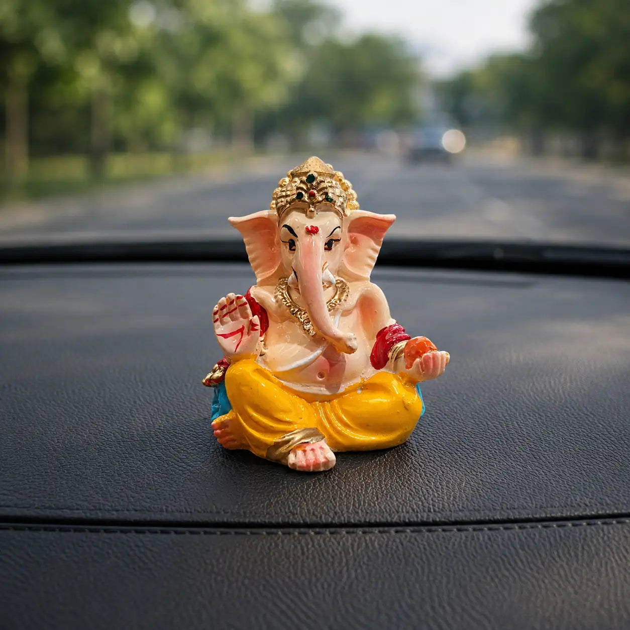DharmikLife Lord Ganesha dashboard idol for car décor, symbolizing blessings, positivity, and protection on every journey.