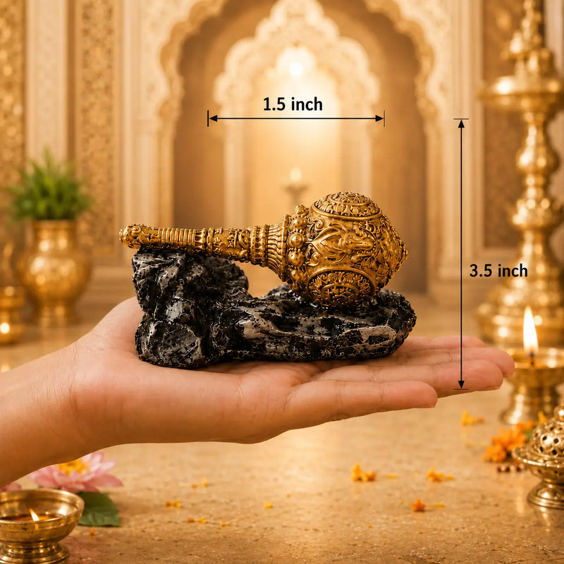 Gada placed on a hand with its length and breadth displaying 