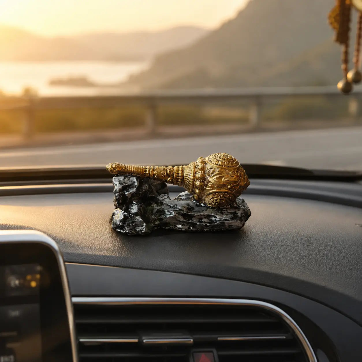 Antique gold Hanuman Gada showpiece for car dashboard decor.