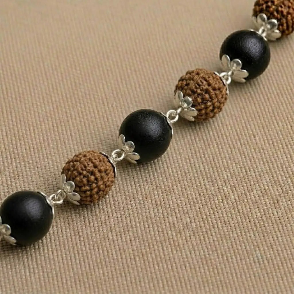 Close up image of Rudraksha & karungali mala 