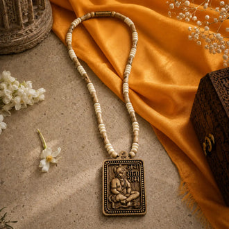 Bageshwar Dham Tulsi Mala 5mm beads placed on an orange cloth and beige background