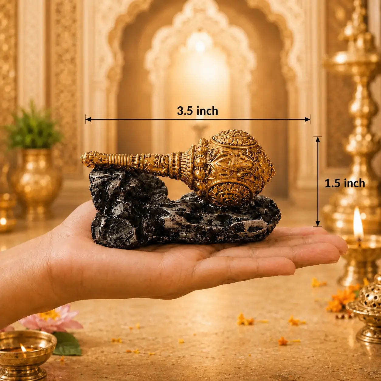 Gada placed on a hand with its length and breadth displaying 