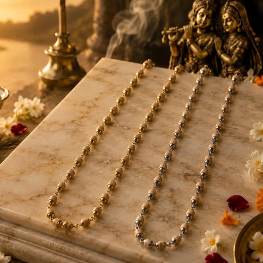 Tulsi Mala Combo (Silver and Gold plated) – 54 Beads, 6 mm, placed on white marble