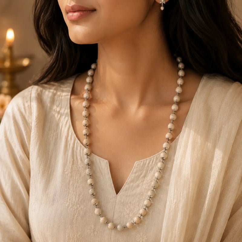 Original Silver-Plated Tulsi Mala – 54 Beads, 10 mm, worn in the neck by a woman
